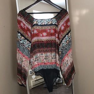 Free people body suit, open back with ties
